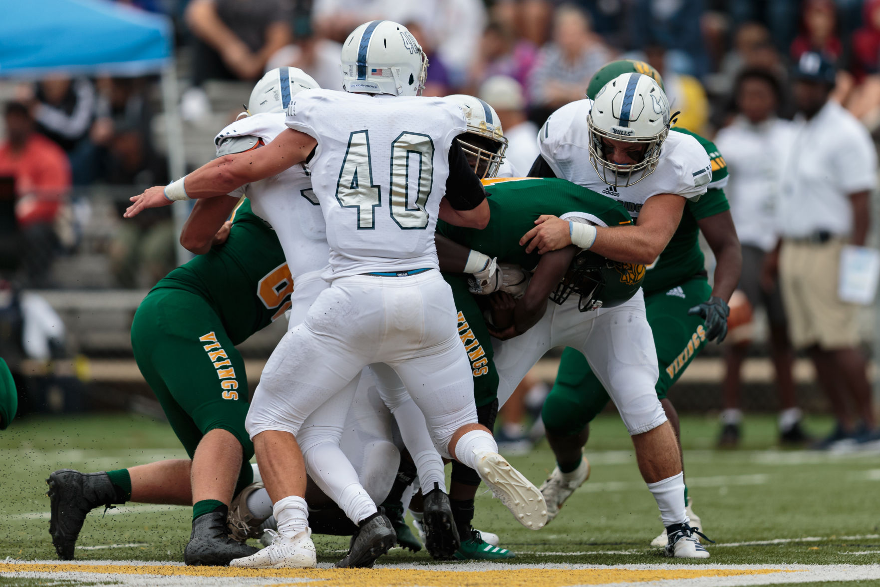 The Ragin' Bulls come from behind in the Battle of the Horns to defeat the Vikings 27-20.